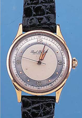 PAUL BUHRE HERRENARMBANDUHR ANTIMAGNETIK, SCHWEIZ UM 1955, METALL HARTVERG., EDELST.- BODEN GESCHR., ORIG. 2-FARB. VERS. BLATT L. FL., 17 ST., ...