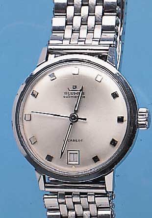 BLUMUS HERRENARMBANDUHR SUBMARINE, SCHWEIZ UM 1965, EDELST., NEUTR. EDELST.-BAND, BODEN GEDR., VERS. BLATT, DATUM BEI 6, 17 ST., RUND-ANKERWERK, ...