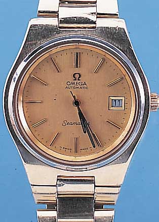 OMEGA HERRENARMBANDUHR SEAMASTER, REF.-NR. 1660238, SCHWEIZ UM 1974, METALL-MASSIVGEH. M. 80 MICRON GG-AUFL. INCL. METALLBAND, MINE- RALFLACHGL., ...