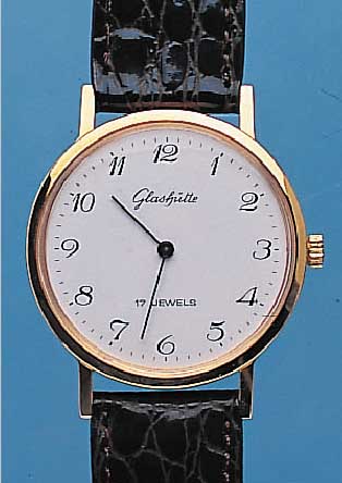 GLASHÜTTE HERRENARMBANDUHR, UNGETR. LAGERW.,UM 1984, LEDERB. NEU, METALL HARTVERG., EDEL- STAHLB. GEDR., EMAILFARB. KONTRASTZIFFEBL., EINGES. ...
