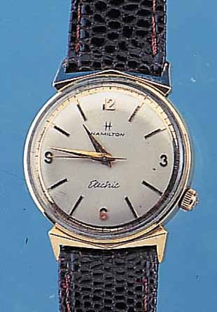 HAMILTON HERRENARMBANDUHR ELECTRIC, REF.- NR. P982044, USA UM 1959, GG-FILLED, EINSCHA- LENAUSF., GET. STELLWELLE, VERS. BLATT, EINE DER ERSTEN ...