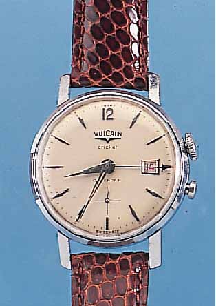 VULCAIN ARMBANDWECKER CRICKET-CALENDAR, REF.-NR. 3103003, SCHWEIZ UM 1958, METALL VERCHR., EDELST.-BODEN GEDR., KL. SEK., VERS. ORIG.-BLATT, ...