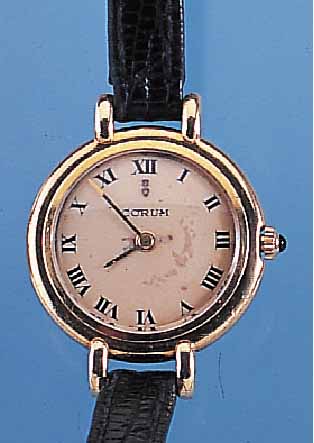 CORUM DAMENARMBANDUHR, REF.-NR. 8192/5, SCHWEIZ UM 1969, GG 750/000 MASSIV, FLACHE GESAMTAUSF., BOMB. SAPHIRGL., BODEN GEDR., ...