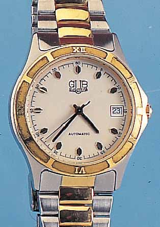GUB HERRENARMBANDUHR AUTOMATIK, DEUTSCHLAND/SCHWEIZ UM 1992, EDELST. TEILW. POL., TEILW. MATT., ZWISCHENGL. SOWIE LüNETTE HARTVERG., ...