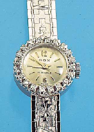 ROX DAMENGOLDBANDUHR, SCHWEIZ UM 1950, WG 750/000-GEH. RODH., BANDGLIEDER SCHMUCKGRAV., AUFWEND. LüNETTE M. 20 8/8 DIAMANTEN ZUS. CA. 0,35 CT ...