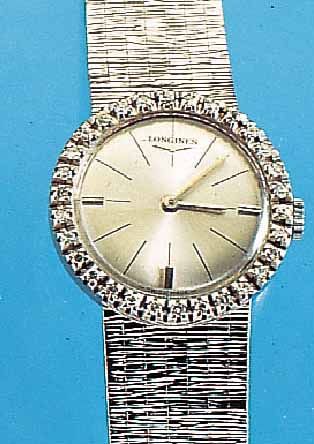 LONGINES DAMENGOLDBANDUHR, SCHWEIZ UM 1968, NEUTR. WG 750/000-GEH. RODH., AUFWEND. LüNETTEM. 30 8/8 DIAMANTEN ZUS. CA. 0,35 CT WEIß/VSI,BODEN ...