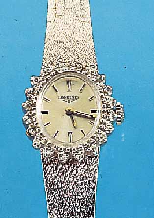 LONGINES DAMENGOLDBANDUHR, SCHWEIZ UM 1968, NEUTR. WG 750/000-GEH. INCL. WG-BAND RODH., AUFW. LüNETTE M. 20 8/8 DIAMANTEN ZUS. CA. 0,2 CT ...