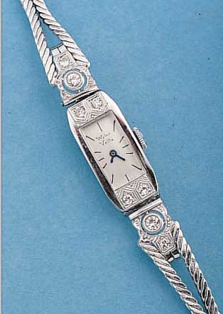 WYLER/VETTA DAMENSCHMUCKUHR ART DECO, SCHWEIZ UM 1937, PLATIN-GEH. M. SCHARNIERB., NACHTR. ANGES. WG 750/000-FLECHTBAND, LüNETTE U. ...