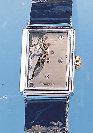DUGENA HERRENARMBANDUHR, DEUTSCHLAND UM 1948METALL VERCHR., SONDERANFERT. WOHL AUF KUNDEN-WUNSCH, BEIDS. VERGL. RECT.-FORM, ZIFFERBL. ERS., 15 ...