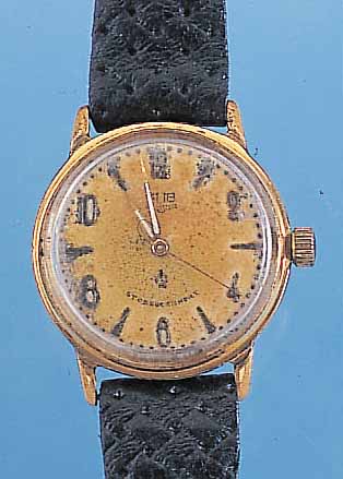 GUB HERRENARMBANDUHR GüTEKLASSE, REF.-NR. 124279, DEUTSCHLAND UM 1957, METALL VERG., STARK BER., EDELST.-BODEN GEDR., ORIG.-BLATT, FL., ...