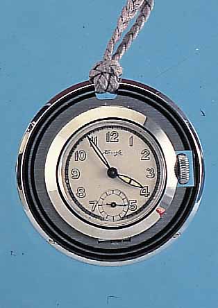 KIENZLE ANHäNGE/TASCHENUHR ART DECO, UM 1940, ORIG.-LAGERK., GEFL. KORDEL, METALL HARTVERCHR., AUS ZU SCHWENKEN UND AUFSTELL- BAR, VERS. ...