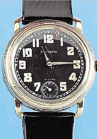 HELVETIA FLIEGERARMBANDUHR, SCHWEIZ UM 1934,NICKEL, SCHARNIERB., GLASR. GEDR., INNEN LüNETTE M. ZEIGER BEIDS. DREHB., SCHW. ...