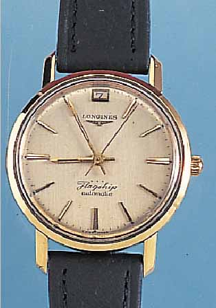 LONGINES HERRENARMBANDUHR FLAGSHIP, REF.-NR.3308-3-194, SCHWEIZ UM 1962, EDELST., GG-HAUBEVERS. ORIG.-BLATT L. FL., DATUM BEI 12, IM ZENTRUM DES ...