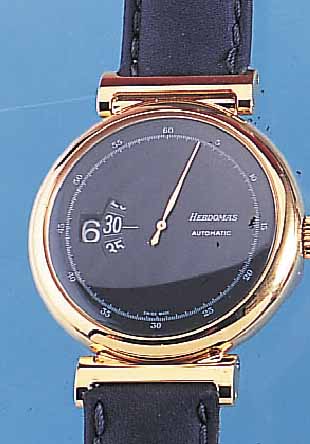 HEBDOMAS HERRENARMBANDUHR, MODELL SALTAREL- LO, 20 MICRON VERG. SILBERGEH., VERGL. BD., AUTOMATIK, SCHW. ZIFFERBL., SPRINGENDE STUNDE,LIMITIERTE ...