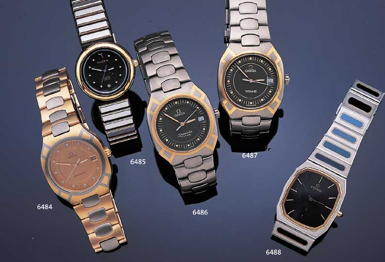 OMEGA HERRENARMBANDUHR, MODELL SEAMASTER, GEH. TITAN/GG, TITANBD. M. FALTSCHLIEßE, QUARTZWERK, SAPHIRGL., ZENTRALSEK., DATUMS- ANZ., ORIG. ...