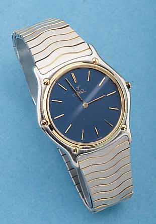 EBEL HERRENARMBANDUHR SPORT CLASSIC, SCHWEIZUM 1990, EDELST. INCL. EDELST.-BAND M. SICHER-HEITSFALTSCHL., SAPHIRFLACHGL., LüNETTE, KRONEU. SCHR. IN ...