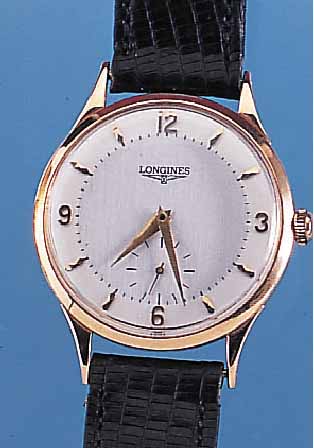 LONGINES HERRENARMBANDUHR, SCHWEIZ UM 1957, NEUTR. RG 750/000-GEH. WOHL FüR SüDAMERIKA, BODEN U. GLASR. GEDR., BLATT REST., 17 ST., ...