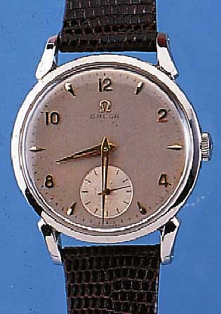 OMEGA HERRENARMBANDUHR, REF.-NR. 2612-4, SCHWEIZ UM 1952, EDELST., BODEN U. GLASR. GE- DR., VERS. BLATT FL., VERG. ANKERW., 15 ST., ...