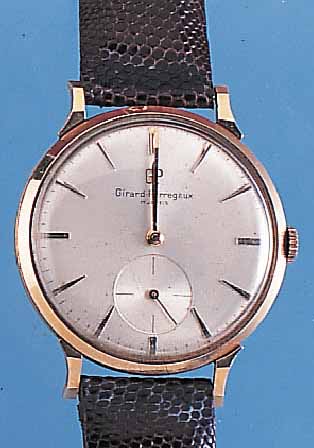 GIRARD PERREGAUX HERRENARMBANDUHR, SCHWEIZ UM 1962, NEUTR. RG 750/000-GEH. (SüDAMERIKA), BODEN U. GLASR. GEDR., ORIG. MATTVERS. BLATT MINIM. FL., ...