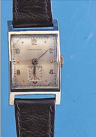 LONGINES HERRENARMBANDUHR, 14 KT GG-GEH., RECTANG-FORM, BOD. AUFGEDR., KONKAVGL. 4- FLäCHIG, ALTERSBED. BERIEB. VERS. ORIG.-BLATT,KL. SEK. ...