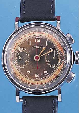 LEMANIA ARMBANDCHRONOGRAPH, REF.-NR. 61332, SCHWEIZ UM 1940, EDELST., GR. AUSF., D. CA. 38 MM, ORIG.-ZIFFERBL. FARBL. GET., 30-MIN.- ...