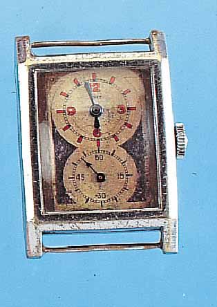 TIBET HERRENARMBANDUHR DOKTORS, SCHWEIZ UM 1934, METALL VERCHR., RECT.-FORM, BER., TYP. AUS DER MITTE GEZ. ZEIGERACHSEN FüR NORMAL- ZEIT U. ...