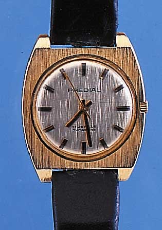 PREDIAL HERRENARMBANDUHR, SCHWEIZ/DEUTSCH- LAND UM 1968, GG 585/000, BODEN GEDR., LüNET- TE U. BLATT MATT., LEDERB. SEK., RUNDANKERW., 17 ST., ...