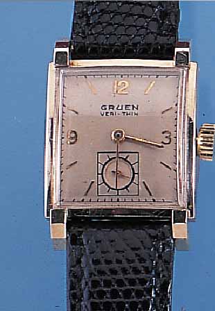 GRUEN HERRENARMBANDUHR VERITHIN, REF.-NR. 530/430, SCHWEIZ/USA UM 1950, GG 585/000, CARREE-FORM M. AUFGES. BANDANST., KONKAVGL., BODEN GEDR., ...