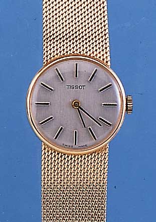 TISSOT DAMENGOLDBANDUHR, REF.-NR. 6307, SCHWEIZ UM 1973, GG 585/000-RUNDGEH. INCL. FLECHTBAND, VERS. BLATT, BODEN GEDR., FORM- ANKERW., ...