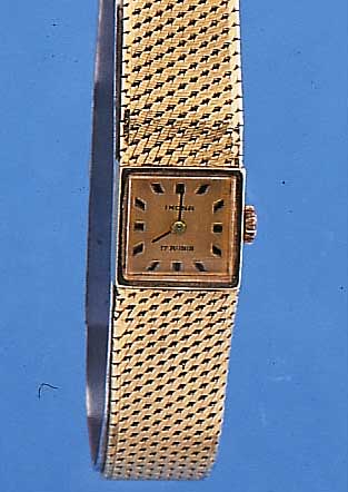 IKONA DAMENGOLDBANDUHR, DEUTSCHLAND UM 1964,GG 585/000, BODEN GEDR., BLATT VERG., FORMAN- KERW., 17 ST., HANDAUFZUG, INCABL. STOßGES., L. CA. 16.5 ...