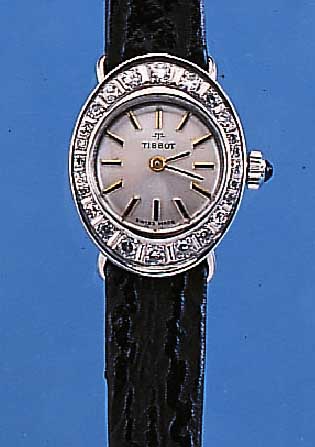 TISSOT DAMENARMBANDUHR, SCHWEIZ UM 1970, NEUTR. WG 585/000-GEH. M. HALBVERD. BANDANST.,LüNETTE AUFW. M. 8/8 DIAMANTEN ZUS. CA. 0,4 CT, ...