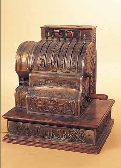 REGISTRIERKASSE, ANKER, UM 1910-20, WEIßGUßGEHäUSE REICH RELIEFIERT, H. CA. 59 CM, LEICHT BESCH., FUNKTION NICHT GEPRüFT