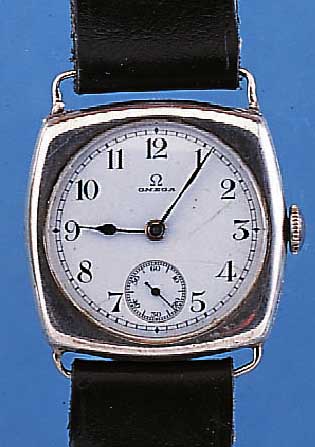 OMEGA HERRENARMBANDUHR, REF.-NR. 6142911, UM 1922, 900ER SILBER, CARREE-CAMBRE-FORM, BODEN U. GLASR. GEDR., ORIG.-BLATT SIGN., FEINHAARR., ...
