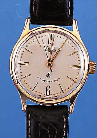 GUB HERRENARMBANDUHR GüTEUHR, REF.-NR. 192594, DEUTSCHLAND UM 1956, METALL ROSE VER- G., EDELST.-SCHR.-BODEN, AUßER KRONE, GLAS U. LEDERB. ...
