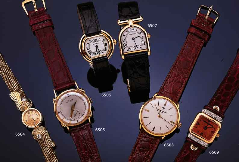 CARTIER DAMENARMBANDUHR TORTUE, SCHWEIZ/ FRANKREICH UM 1978, GG 750/000, BODEN UNTER DEN BANDANST. VERSCHR., SCHMUCKKRONE, BOMB. MINERALGL., ...