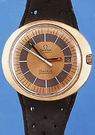 OMEGA HERRENARMBANDUHR DYMAMIK, SCHWEIZ UM 1970, EDELST.-EINSCHALENGEH., GET. A-WELLE, BEI FERTIGST. WASSERGESCH., STARKE GG-HAUBE, ...