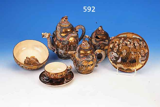 TEESERVICE, JAPAN, SATSUMA, UM 1910, STEIN- GUT, BUNTE BEMALUNG, REICHE GOLDSTAFFAGE, PERSONEN U. GLüCKSSYMBOLIK, DECKELBEKRöNUNGEN IN FORM ...