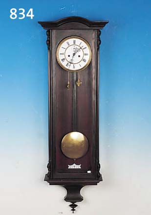 WANDUHR, GUSTAV BECKER, UM 1880, HOLZGEHäU- SE, BEKRöNUNGEN FEHLEN, SEK. GELACKT, DREI- SEITIG VERGLAST, ZWEIGETEILTES EMAILZIFFER- BLATT MIT ...