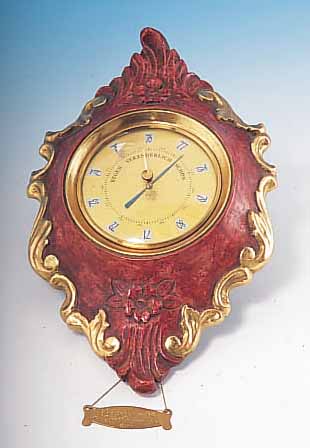 SCHOLZ BAROMETER IN FORM EINER KARTELLWANDUHR, MASSIV HOLZ HANDGESCHN., 23 KT. VERG., ANBEI ORIG.-SCHILD, MAßE 33 X 20 CM