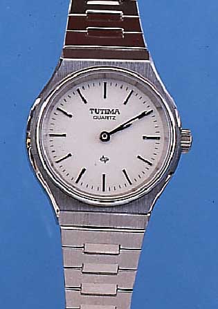 KONVOLUT: 2 TUTIMA DAMENARMBANDUHREN, BEIDE UNGETR. LAGERW., DEUTSCHLAND UM 1982, EDELST.,EDELST.-BAND, NACH GESCHäFTSAUFL., 1X SCHW., 1X WEIßES ...