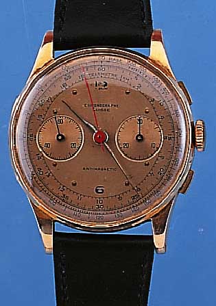 LANDERON ARMBANDCHRONOGRAPH, REF.-NR.804955,SCHWEIZ UM 1948, ROSE-G. 750/000, BODEN U. GLASR. GEDR., METALLCUV. ZUR ARMIERUNG, ORIG.-BLATT BEZ. ...