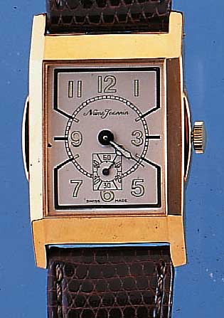 NUMA JANNIN HERRENARMBANDUHR, SCHWEIZ UM 1980, METALL HART VERG., EDELST.-SCHARNIER- BODEN, LEDERB., STILTYP. 30ER JAHRE, UNGETR. LAGERW., ...