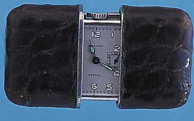 MOVADO REISESCHIEBEüHRCHEN ERMETO, NICKEL, BEIDE HALBSCH. LEDERBEZ., AUFSTELLB., VERS. BLATT, 15 ST., HANDAUFZUG, KOMP.-UNR., GEBL. ...