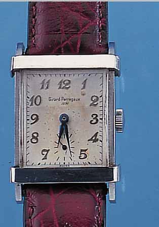 GIRARD PERREGAUX HERRENARMBANDUHR, REF.-NR. 15/5623, SCHWEIZ UM 1950, EDELST., AUFWEND. RECT.-FORM, KONKAVGL., BODEN GEDR., VERS. ORIG.-BLATT, ...