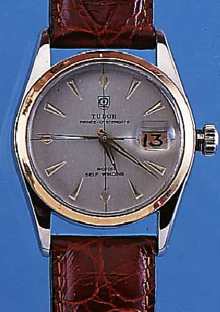 TUDOR HERRENARMBANDUHR OYSTER DATE, REF.-NR.7914, SCHWEIZ UM 1952, EDELST., BODEN U. KRONEGESCHR., PRINZIP ROLEX, GOLDLüNETTE, BLATT REST., WERK ...