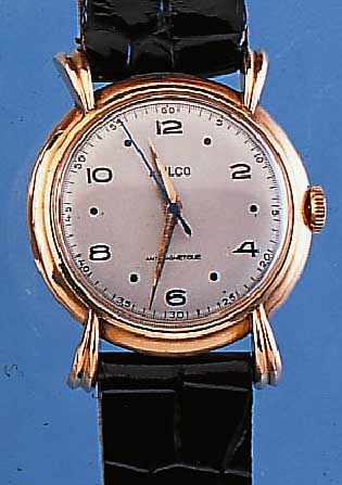 MULCO HERRENARMBANDUHR ANTIMAGNETIC, REF.- NR. 14/106, SCHWEIZ UM 1950, ROSE-G. 750/000, AUFWEND. RUNDFORM M. BET., GESPR. BANDANST., BLATT REST., ...