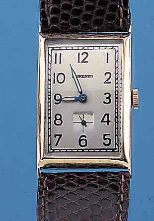 HERRENARMBANDUHR, SCHWEIZ UM 1930, GG 750/ 000, RECT.-FORM, MAßE CA. 40 X 25 MM, SCHAR- NIERBODEN, BOMB. MINERALGL., BAND NEU, BLATT REST. ...