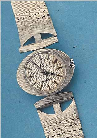 JUWELIA DAMENGOLDBANDUHR, SCHWEIZ/DEUTSCH- LAND UM 1966, WG 585/000 RODH., BODEN GEDR., FORMANKERW., 17 ST., HANDAUFZUGKAL. VON AS, INCABL. ...