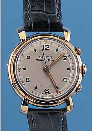 JUNGHANS/BULOVA ARMBANDWECKER, DEUTSCHLAND UM 1952, METALL M. GG-AUFLAGE, AUßER LEDERB. ORIG.-ZUSTAND, WECKZEIT EINSTELLBAR AUßEN 2, ...