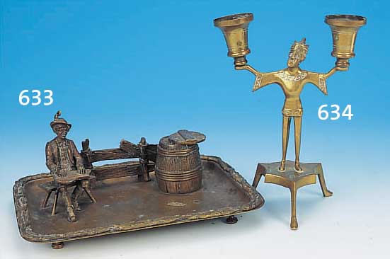 KERZENSTäNDER, DEUTSCH, UM 1870, MESSING, VOLLPLAST. DARS. EINES ORIENTALEN DER DIE TüLLEN IN HäNDEN TRäGT (DIESE SEK. ERGäNZT), H. CA. ...